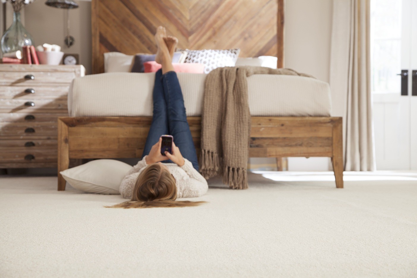 Girl lying on carpet | Thornton Flooring