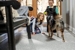 Kids on carpet with pet friendly | Thornton Flooring