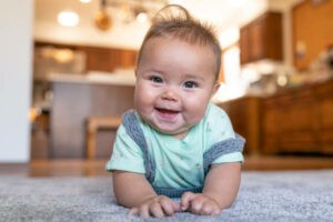 baby lying on carpet | Thornton Flooring